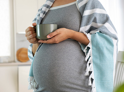 Pregnant woman thinking about adoption services for her baby